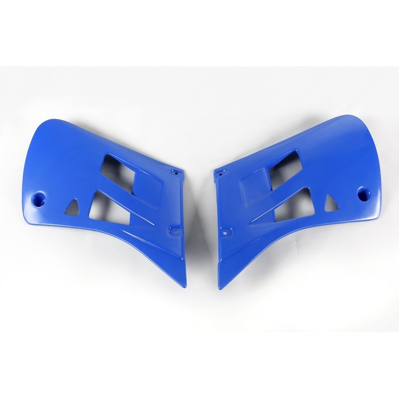 Plásticos laterales de radiador UFO TM azul TM03125-091 - motoscamaralweb.com Plásticos laterales de radiador UFO TM azul TM03125-091 - motoscamaralweb.com